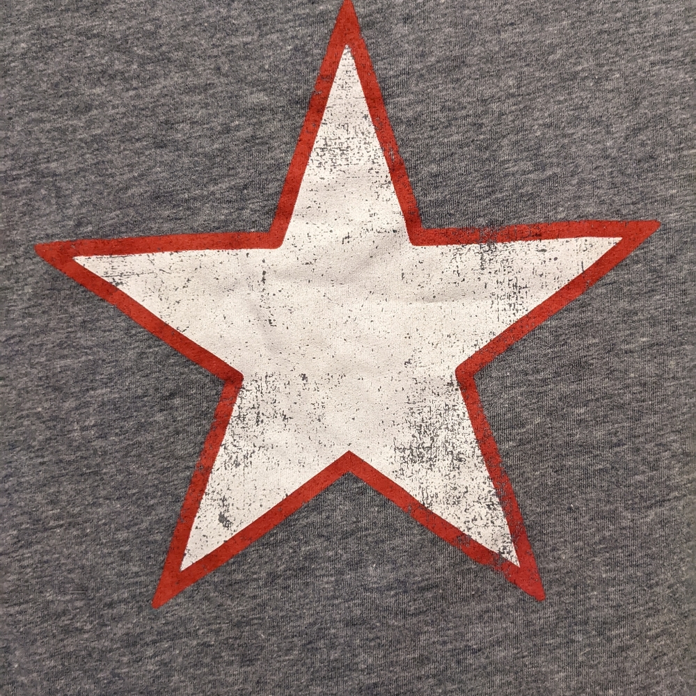 Red white and blue star. Heather blueish grey. XS tee